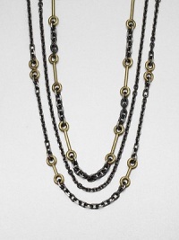 A two-tone design featuring link chains in various sizes accented with antique-finished brass links. HematiteAntique-finished brassLength, about 30Lobster clasp closureImported A two-tone design featuring link chains in various sizes accented with antique-finished brass links. HematiteAntique-finished brassLength, about 30Lobster clasp closureImported