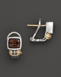 A simply elegant touch for your casual or dressy ensemble, smokey topaz earrings with filigree sterling silver casing and goldtone accents. Designed by Lagos. A simply elegant touch for your casual or dressy ensemble, smokey topaz earrings with filigree sterling silver casing and goldtone accents. Designed by Lagos.