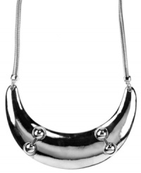 Heavy metal. Add a chic, contemporary twist to your wardrobe with Nine West's striking bib statement necklace. Set in silver tone mixed metal. Approximate length: 16 inches. Heavy metal. Add a chic, contemporary twist to your wardrobe with Nine West's striking bib statement necklace. Set in silver tone mixed metal. Approximate length: 16 inches.