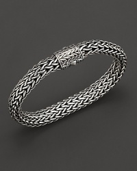 Intricately woven sterling silver from the John Hardy Chain collection. Intricately woven sterling silver from the John Hardy Chain collection.
