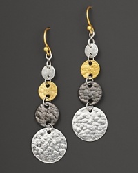 Blending tones of white silver, dark silver and 24 Kt. yellow gold, this triple-drop earring from Gurhan is crafted with flat discs of hammered silver with yellow gold French wire backs. Blending tones of white silver, dark silver and 24 Kt. yellow gold, this triple-drop earring from Gurhan is crafted with flat discs of hammered silver with yellow gold French wire backs.