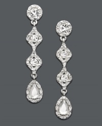 Get academy award-winning style with these glamorous drops. Charter Club earrings feature round and pear-cut crystals in a silver tone mixed metal setting. Approximate drop: 3 inches. Get academy award-winning style with these glamorous drops. Charter Club earrings feature round and pear-cut crystals in a silver tone mixed metal setting. Approximate drop: 3 inches.