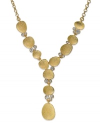 Charter Club's shimmering y-shaped necklace features sparkling glass stones and golden pebbles on a cupchain. Crafted in gold tone mixed metal. Approximate length: 16 inches + 2-inch extender. Approximate drop: 4 inches. Charter Club's shimmering y-shaped necklace features sparkling glass stones and golden pebbles on a cupchain. Crafted in gold tone mixed metal. Approximate length: 16 inches + 2-inch extender. Approximate drop: 4 inches.