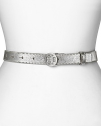 Subtle and silvery. Tory Burch's metallic skinny belt gives a fashion-forward waistline the designer treatment. Subtle and silvery. Tory Burch's metallic skinny belt gives a fashion-forward waistline the designer treatment.