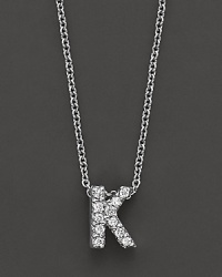 From the Tiny Treasures collection, a diamond K necklace. With signature ruby accent. Designed by Roberto Coin. From the Tiny Treasures collection, a diamond K necklace. With signature ruby accent. Designed by Roberto Coin.