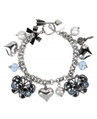 Spring from your cocoon this season! Betsey Johnson's darling toggle bracelet combines blue-crystal butterfly and heart charms with blue faceted beads, glass pearls and metal accents. Set in rhodium-plated mixed metal. Approximate length: 7-1/2 inches. Spring from your cocoon this season! Betsey Johnson's darling toggle bracelet combines blue-crystal butterfly and heart charms with blue faceted beads, glass pearls and metal accents. Set in rhodium-plated mixed metal. Approximate length: 7-1/2 inches.