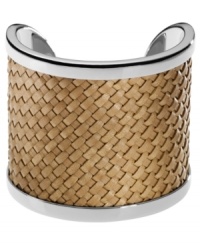 Weave together your perfect ensemble. This Michael Kors cuff bracelet features natural braided leather sitting atop silver tone brass. Approximate diameter: 2-1/4 inches. Weave together your perfect ensemble. This Michael Kors cuff bracelet features natural braided leather sitting atop silver tone brass. Approximate diameter: 2-1/4 inches.
