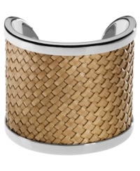 Weave together your perfect ensemble. This Michael Kors cuff bracelet features natural braided leather sitting atop silver tone brass. Approximate diameter: 2-1/4 inches.