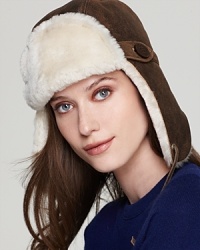 With a shearling lining and plush earflaps, this UGG® Australia trapper hat is the epitome of winter warmth. With a shearling lining and plush earflaps, this UGG® Australia trapper hat is the epitome of winter warmth.