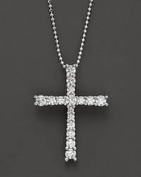 White gold graduated diamond cross pendant with ball chain. White gold graduated diamond cross pendant with ball chain.