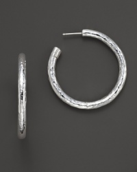 From the Silver collection, skinny electroform hoop earrings in sterling silver. Designed by Ippolita. From the Silver collection, skinny electroform hoop earrings in sterling silver. Designed by Ippolita.