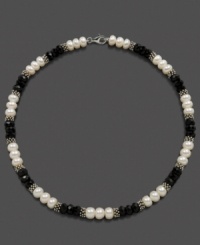 Light and dark, juxtaposed perfectly. Triplets of cultured freshwater pearl (8-9 mm) and faceted onyx beads (8 mm) alternate with sterling silver beads to create a stunning necklace. Set in sterling silver. Approximate length: 18 inches.