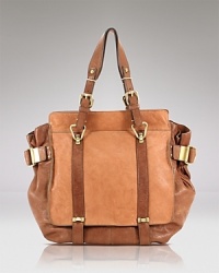 Carry this season's tonal leather obsession with this leather satchel from Kooba. This roomy style is the perfect way to lend on-trend style to your day-to-day wardrobe. Carry this season's tonal leather obsession with this leather satchel from Kooba. This roomy style is the perfect way to lend on-trend style to your day-to-day wardrobe.