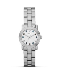 Encircled by colored, glimmering crystals, MARC BY MARC JACOBS's Mini Dexter bracelet watch lends an everyday look livened up with a hint of glamour. Encircled by colored, glimmering crystals, MARC BY MARC JACOBS's Mini Dexter bracelet watch lends an everyday look livened up with a hint of glamour.