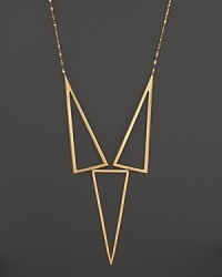 Geometric shapes lend modern edge to this 14K gold necklace from Lana. Geometric shapes lend modern edge to this 14K gold necklace from Lana.