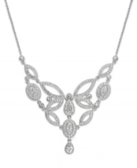It's all in the name. Eliot Danori's Windsor frontal necklace epitomizes elegance with its decadent setting adorned with sparkling cubic zirconias (3/4 ct. t.w.) and crystals. Set in rhodium-plated mixed metal. Approximate length: 16 inches + 2-inch extender. Approximate drop: 1-1/2 inches. It's all in the name. Eliot Danori's Windsor frontal necklace epitomizes elegance with its decadent setting adorned with sparkling cubic zirconias (3/4 ct. t.w.) and crystals. Set in rhodium-plated mixed metal. Approximate length: 16 inches + 2-inch extender. Approximate drop: 1-1/2 inches.