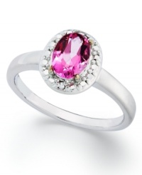 Pink perfection. Victoria Townsend's pretty ring features an oval-cut pink topaz (1-1/10 ct. t.w.) surrounded by diamond accents. Set in sterling silver. Size 7. Pink perfection. Victoria Townsend's pretty ring features an oval-cut pink topaz (1-1/10 ct. t.w.) surrounded by diamond accents. Set in sterling silver. Size 7.