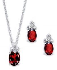 Crimson chic! Victoria Townsend's beautiful earrings and matching pendant feature oval-cut garnet (3-3/8 ct. t.w.) topped by a trio of sparkling diamond accents. Crafted in sterling silver. Approximate length: 18 inches. Approximate drop (pendant): 1/2 inch. Approximate drop (earrings): 1/2 inch. Crimson chic! Victoria Townsend's beautiful earrings and matching pendant feature oval-cut garnet (3-3/8 ct. t.w.) topped by a trio of sparkling diamond accents. Crafted in sterling silver. Approximate length: 18 inches. Approximate drop (pendant): 1/2 inch. Approximate drop (earrings): 1/2 inch.