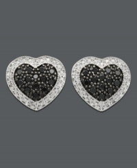 Simple studs in chic, heart shapes. Sterling silver earrings feature a black diamond center (1/3 ct. t.w) surrounded by white diamond edges (1/8 ct. t.w.). Approximate diameter: 1/2 inch. Simple studs in chic, heart shapes. Sterling silver earrings feature a black diamond center (1/3 ct. t.w) surrounded by white diamond edges (1/8 ct. t.w.). Approximate diameter: 1/2 inch.