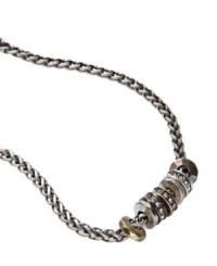 Fossil hits a vintage note with this chain necklace. Multitone mixed metal crystal-accented rondelle beads hang like miniature rings from a silvertone wheat chain. Approximate length: 16 inches. Fossil hits a vintage note with this chain necklace. Multitone mixed metal crystal-accented rondelle beads hang like miniature rings from a silvertone wheat chain. Approximate length: 16 inches.