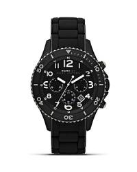 Solid and stylish, this brushed gunmetal watch from MARC BY MARC JACOBS with a silicone bracelet, date feature, bold accents, and chronograph movement will take your style up a tick. Wear it to sharpen your look. Solid and stylish, this brushed gunmetal watch from MARC BY MARC JACOBS with a silicone bracelet, date feature, bold accents, and chronograph movement will take your style up a tick. Wear it to sharpen your look.