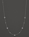 Stations of diamonds and clear quartz dot a sterling silver chain. By Ippolita.