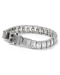Serve up statement shine with MICHAEL Michael Kors' silver-plated tennis bracelet. This piece boasts versatility, so style it with both favorite denim and party frocks. Serve up statement shine with MICHAEL Michael Kors' silver-plated tennis bracelet. This piece boasts versatility, so style it with both favorite denim and party frocks.