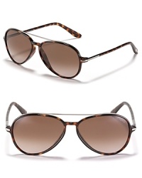 Retro chic style defines the timeless cool of these Tom Ford aviator sunglasses, featuring a rugged, silver-tone top bar. Retro chic style defines the timeless cool of these Tom Ford aviator sunglasses, featuring a rugged, silver-tone top bar.