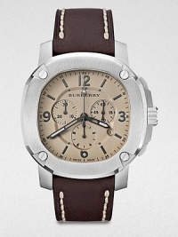 A technical timepiece with a brushed, stainless steel case and a luxurious, stitched leather strap. Quartz movementWater resistant to 10 ATMOctagonal stainless steel case, 47mm (1.9) Screw accented bezelTrench chronograph dialBar and numeric hour markersDate display at 4 o'clockSecond hand Brown stitched leather strapMade in Switzerland 