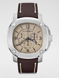 A technical timepiece with a brushed, stainless steel case and a luxurious, stitched leather strap. Quartz movementWater resistant to 10 ATMOctagonal stainless steel case, 47mm (1.9) Screw accented bezelTrench chronograph dialBar and numeric hour markersDate display at 4 o'clockSecond hand Brown stitched leather strapMade in Switzerland A technical timepiece with a brushed, stainless steel case and a luxurious, stitched leather strap. Quartz movementWater resistant to 10 ATMOctagonal stainless steel case, 47mm (1.9) Screw accented bezelTrench chronograph dialBar and numeric hour markersDate display at 4 o'clockSecond hand Brown stitched leather strapMade in Switzerland