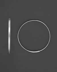 A graceful hoop in white gold with invisible closure to create a perfectly elegant orb to complement your most refined ensembles. Designed by Lana. A graceful hoop in white gold with invisible closure to create a perfectly elegant orb to complement your most refined ensembles. Designed by Lana.