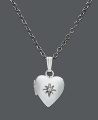 A timeless keepsake in silver. This children's heart locket features a central diamond accent. Set in sterling silver. Approximate length: 13 inches. Approximate drop: 1/2 inch. A timeless keepsake in silver. This children's heart locket features a central diamond accent. Set in sterling silver. Approximate length: 13 inches. Approximate drop: 1/2 inch.