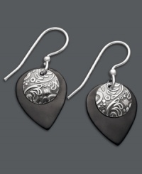 Embrace the boho-chic styles of Jody Coyote. This free-spirited pair of earrings feature teardrop-shaped black patina bronze and a circular sterling silver charm. Approximate drop: 1-1/8 inches. Embrace the boho-chic styles of Jody Coyote. This free-spirited pair of earrings feature teardrop-shaped black patina bronze and a circular sterling silver charm. Approximate drop: 1-1/8 inches.
