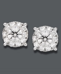 Simple perfection. Prestige Unity's diamond stud earrings are like no other. Earrings feature a single round-cut diamond (1/2 ct. t.w.) encircled by round-cut diamond accents. Crafted in 14k white gold. Approximate diameter: 5-8/10 mm. Simple perfection. Prestige Unity's diamond stud earrings are like no other. Earrings feature a single round-cut diamond (1/2 ct. t.w.) encircled by round-cut diamond accents. Crafted in 14k white gold. Approximate diameter: 5-8/10 mm.