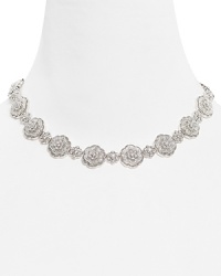 Love: the Nadri Love Knot All Around Necklace encircles you in elegance, with a beautiful, pavé floral motif. Love: the Nadri Love Knot All Around Necklace encircles you in elegance, with a beautiful, pavé floral motif.