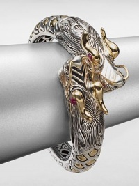 From the Naga Collection. This zodiac-inspired style from a socially and environmentally responsible brand features sterling silver dragons heads accented with radiant 18k gold. Sterling silver18k goldGlass-filled ruby eyesDiameter, about 2.3Kick closureImported From the Naga Collection. This zodiac-inspired style from a socially and environmentally responsible brand features sterling silver dragons heads accented with radiant 18k gold. Sterling silver18k goldGlass-filled ruby eyesDiameter, about 2.3Kick closureImported