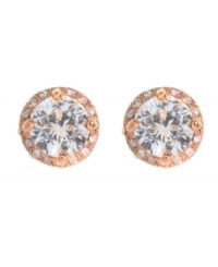 Studs that sparkle in the light. Betsey Johnson earrings feature a round-cut crystal surrounded by a halo of glittering glass stones. Set in antique gold tone mixed metal. Approximate diameter: 1 inch. Studs that sparkle in the light. Betsey Johnson earrings feature a round-cut crystal surrounded by a halo of glittering glass stones. Set in antique gold tone mixed metal. Approximate diameter: 1 inch.