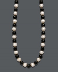 Show your true stripes with stylish, contrasting colors. Necklace features a chic strand of bold onyx beads (85 ct. t.w.) and cultured freshwater pearls (8-9 mm). Clasp crafted in 14k gold. Approximate length: 18 inches. Show your true stripes with stylish, contrasting colors. Necklace features a chic strand of bold onyx beads (85 ct. t.w.) and cultured freshwater pearls (8-9 mm). Clasp crafted in 14k gold. Approximate length: 18 inches.