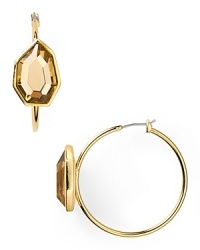 Define elegance with this pair of stone-accented hoop earrings from T Tahari. A delicate topaz colored crystal is set in a gleaming 14-karat gold setting. Define elegance with this pair of stone-accented hoop earrings from T Tahari. A delicate topaz colored crystal is set in a gleaming 14-karat gold setting.
