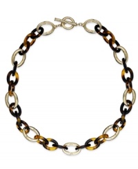 The missing link in your jewelry box. This toggle necklace from Lauren Ralph Lauren features an oval-linked chain in tortoise resin and 14k gold-plated mixed metal. Approximate length: 18 inches. The missing link in your jewelry box. This toggle necklace from Lauren Ralph Lauren features an oval-linked chain in tortoise resin and 14k gold-plated mixed metal. Approximate length: 18 inches.