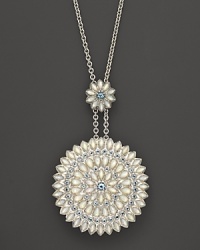 This unique pendant necklace from Paul Morelli doubles as a locket--a sparkling statement piece that lends instant luxury. This unique pendant necklace from Paul Morelli doubles as a locket--a sparkling statement piece that lends instant luxury.