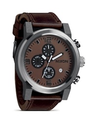 In a chronograph design, Nixon's The Ride watch mixes stainless steel with rustic leather for a look that makes a bold yet laid-back impression. In a chronograph design, Nixon's The Ride watch mixes stainless steel with rustic leather for a look that makes a bold yet laid-back impression.
