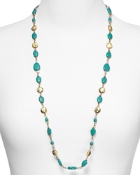 Embellished with striking turquoise beads and hammered stations, Lauren Ralph Lauren's link necklace is a striking adornment. Layer it over a crisp collar for a cool contrast. Embellished with striking turquoise beads and hammered stations, Lauren Ralph Lauren's link necklace is a striking adornment. Layer it over a crisp collar for a cool contrast.