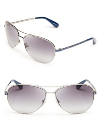 The classic aviator gets a stylish update with colorful arms from MARC BY MARC JACOBS. The classic aviator gets a stylish update with colorful arms from MARC BY MARC JACOBS.