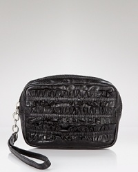 With a ruffle trim and wrist strap, Hobo's leather coin purse is a cute and compact spot to stow your change. With a ruffle trim and wrist strap, Hobo's leather coin purse is a cute and compact spot to stow your change.