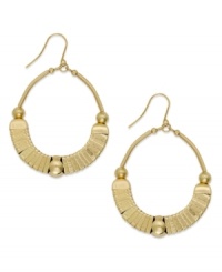 Enter the golden age. These drop earrings from Style&co., featuring round accents, are crafted from gold tone mixed metal, giving them enough shine to light up the evening. Approximate drop: 2-1/4 inches. Enter the golden age. These drop earrings from Style&co., featuring round accents, are crafted from gold tone mixed metal, giving them enough shine to light up the evening. Approximate drop: 2-1/4 inches.
