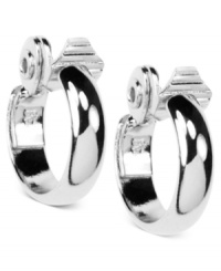 The endless elegance of hoops. These Anne Klein earrings boast a medium silhouette with a sophisticated shine. Crafted in silver tone mixed metal. Approximate drop: 1 inch. The endless elegance of hoops. These Anne Klein earrings boast a medium silhouette with a sophisticated shine. Crafted in silver tone mixed metal. Approximate drop: 1 inch.