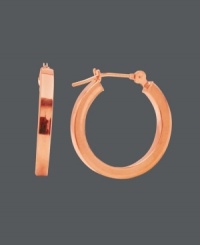 Simple hoops capture the trends effortlessly in chic, caramel color. Features a small hoop design and click backing crafted in 14k rose gold. Approximate diameter: 5/8 inch.