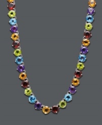 Add a bright splash of color to your neckline. Necklace features round-cut blue topaz (8-3/4 ct. t.w.), amethyst (5-3/4 ct. t.w.), citrine (7-1/5 ct. t.w.), garnet (8-5/8 ct. t.w.), and peridot (7-9/10 ct. t.w.). Crafted in sterling silver. Approximate length: 18 inches. Add a bright splash of color to your neckline. Necklace features round-cut blue topaz (8-3/4 ct. t.w.), amethyst (5-3/4 ct. t.w.), citrine (7-1/5 ct. t.w.), garnet (8-5/8 ct. t.w.), and peridot (7-9/10 ct. t.w.). Crafted in sterling silver. Approximate length: 18 inches.