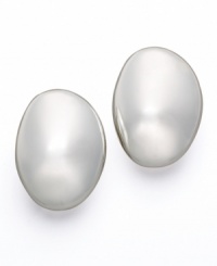Simple silvertone stud earrings with artistic flair, by Lauren by Ralph Lauren. Clips crafted in mixed metal. Approximate diameter: 3/4 inch. Simple silvertone stud earrings with artistic flair, by Lauren by Ralph Lauren. Clips crafted in mixed metal. Approximate diameter: 3/4 inch.